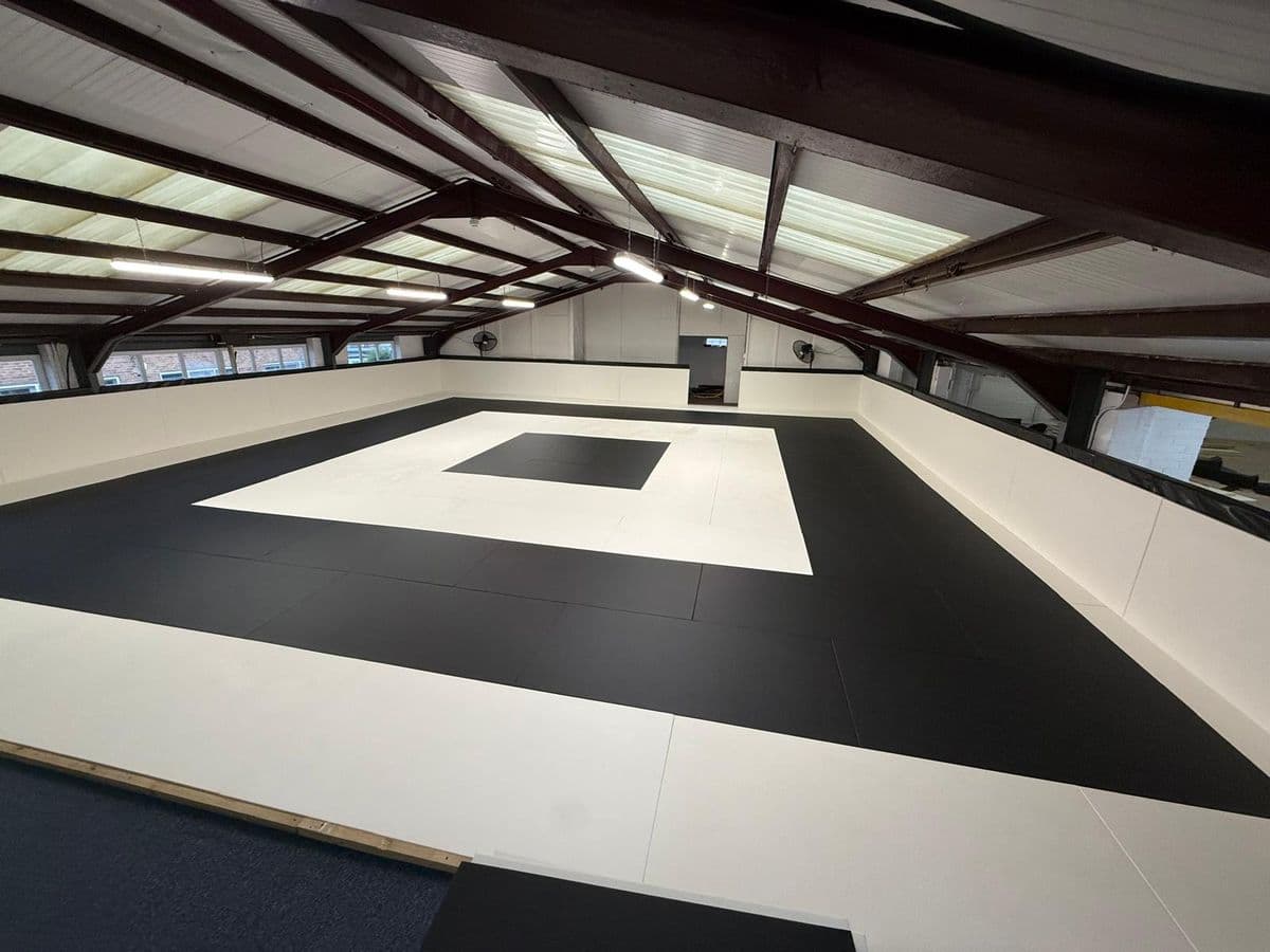 Wide view of the mat room with padded walls
